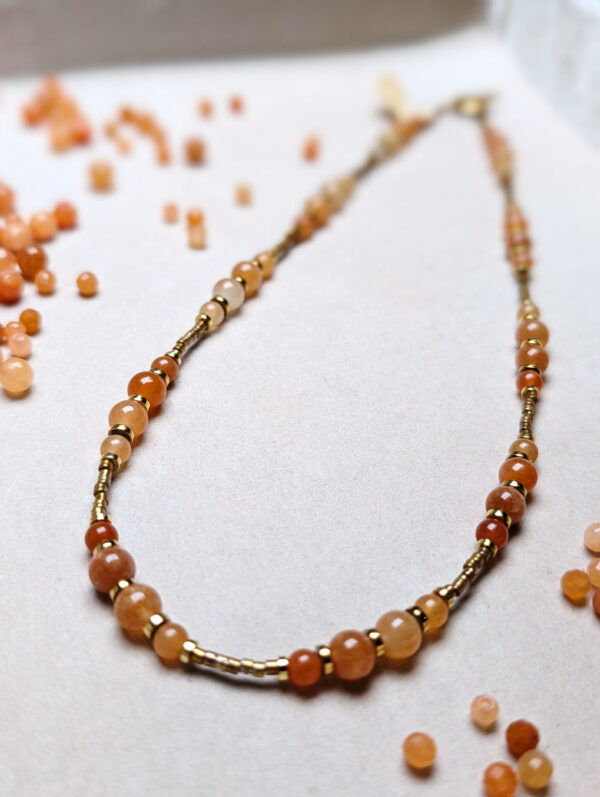 PXL_20251201_141916800.PORTRAIT Awenturyn Pomarańczowy Hematyt