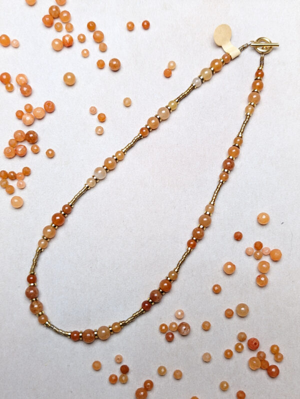 PXL_20251201_141929726.PORTRAIT.ORIGINAL Awenturyn Pomarańczowy Hematyt