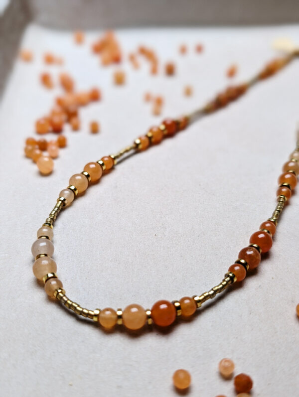 PXL_20251201_142218626.PORTRAIT Awenturyn Pomarańczowy Hematyt