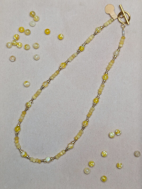 PXL_20251201_210609108.PORTRAIT.ORIGINAL Agat Żółty Chalcedon Hematyt